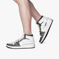 walking with high-top leather sneakers