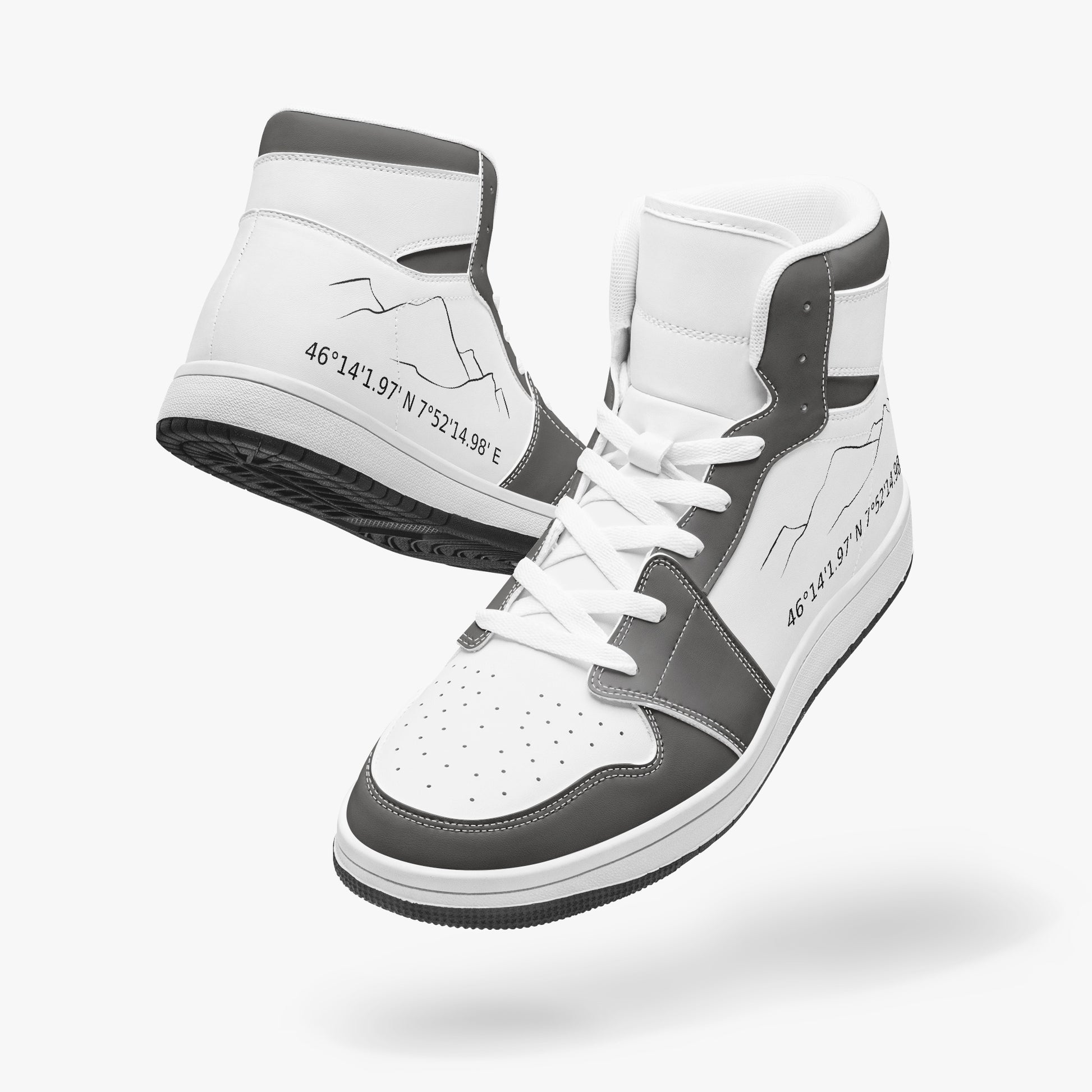 pair of high-top leather sneakers - angle view