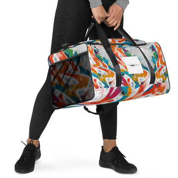 man carrying a large duffle bag