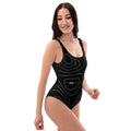woman wearing one-piece black swimsuit