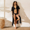 woman wearing stylish black bikinis