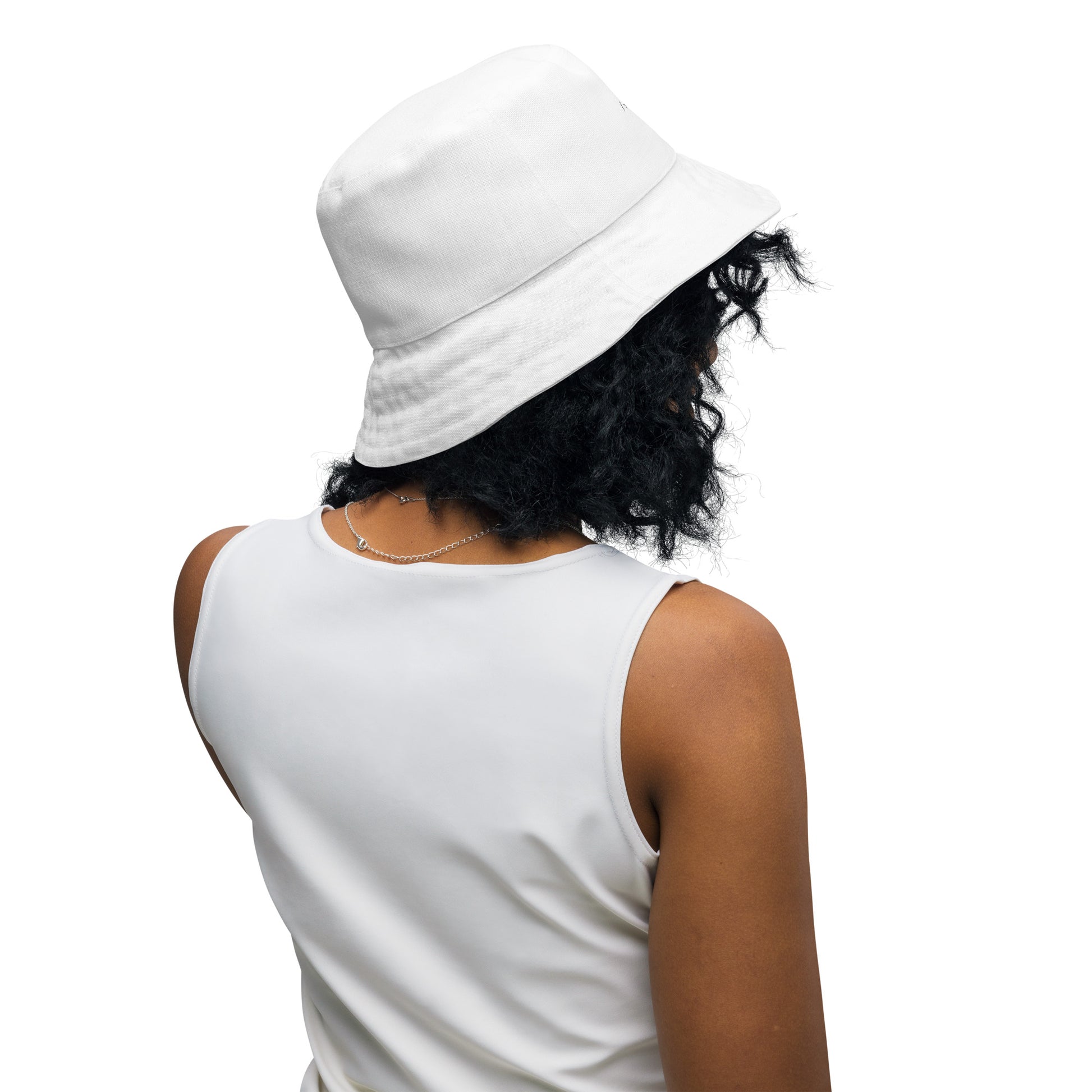 woman wearing reversible bucket hat - back