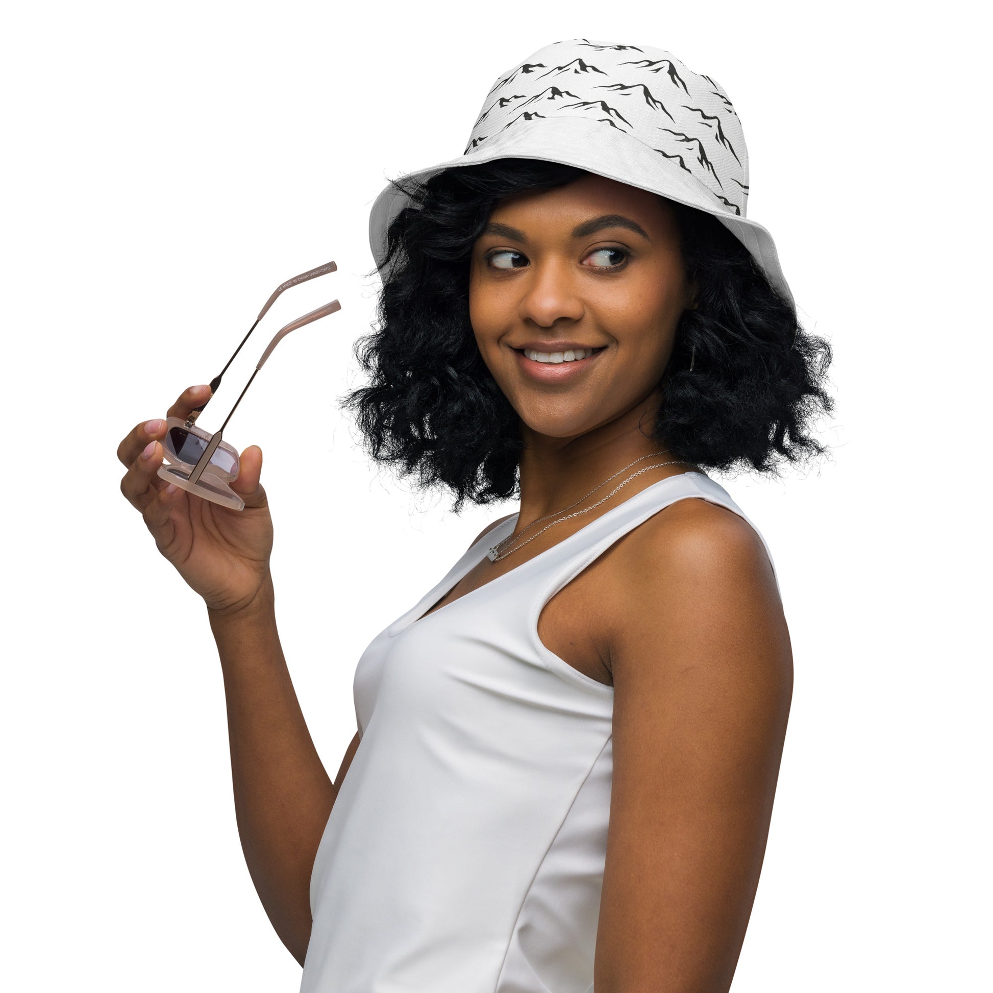 woman wearing custom designed reversible bucket hat