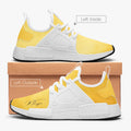 pair of athletic sneakers with shoe box