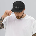 person wearing black vintage snapback hat