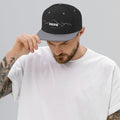 person wearing black & silver vintage snapback hat