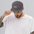 person wearing dark grey vintage snapback hat