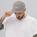 person wearing heather grey vintage snapback hat