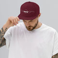 person wearing maroon vintage snapback hat
