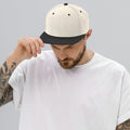 person wearing natural & black vintage snapback hat