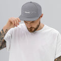 person wearing silver vintage snapback hat