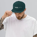 person wearing spruce vintage snapback hat