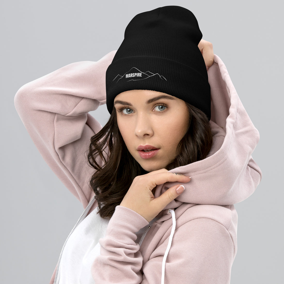 person wearing black beanie hat