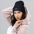 person wearing navy beanie hat