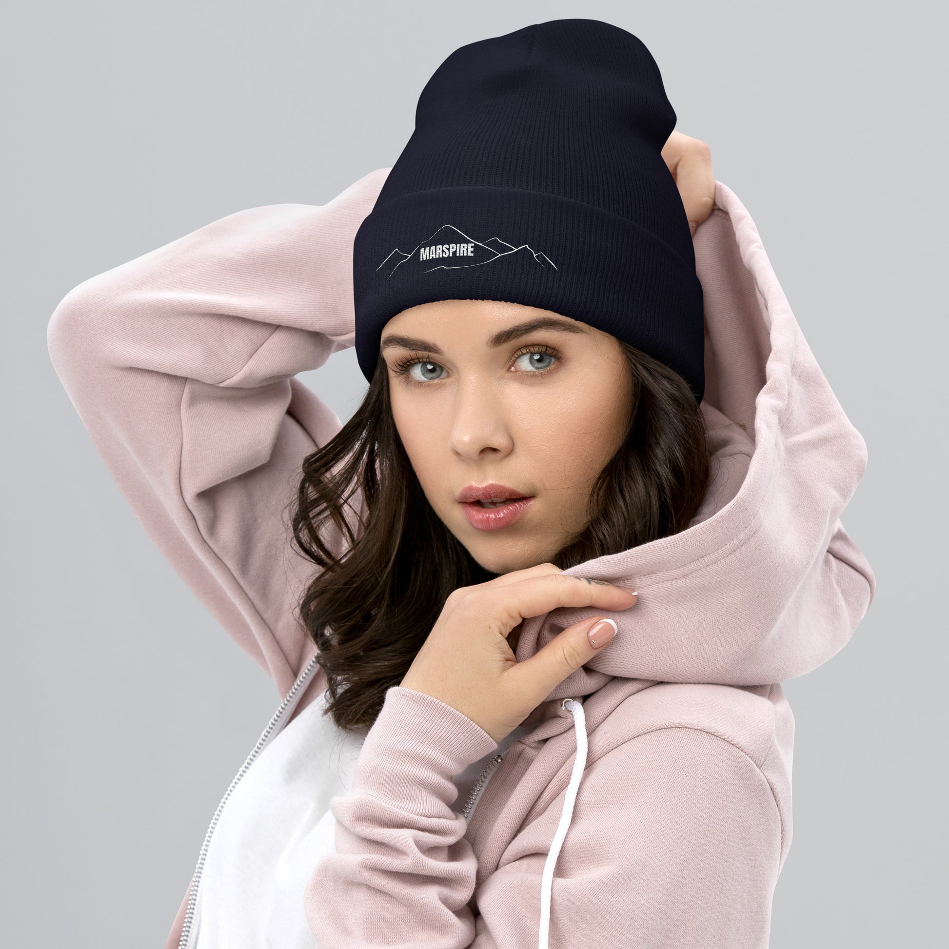 person wearing navy beanie hat