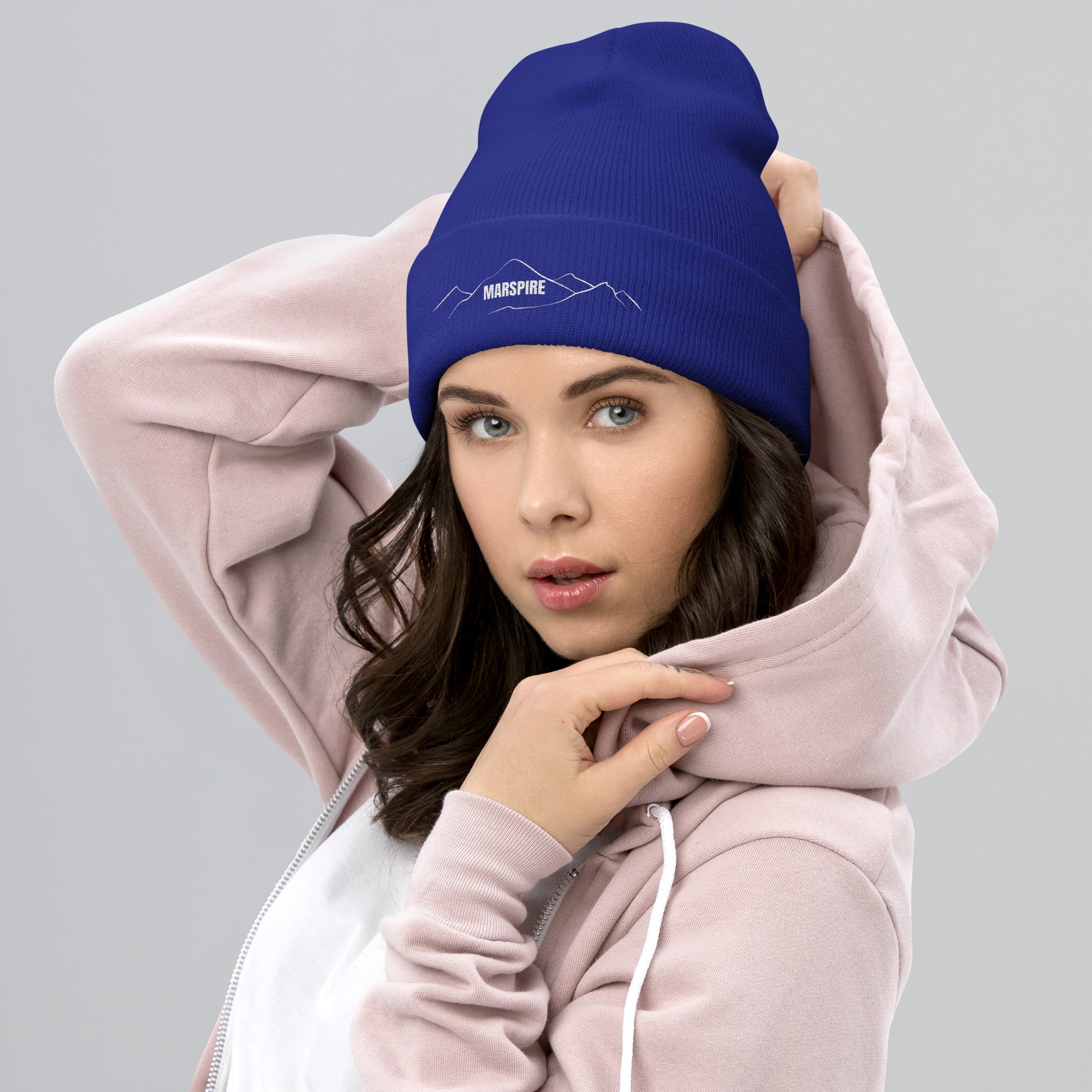 person wearing royal beanie hat