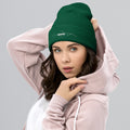 person wearing spruce beanie hat