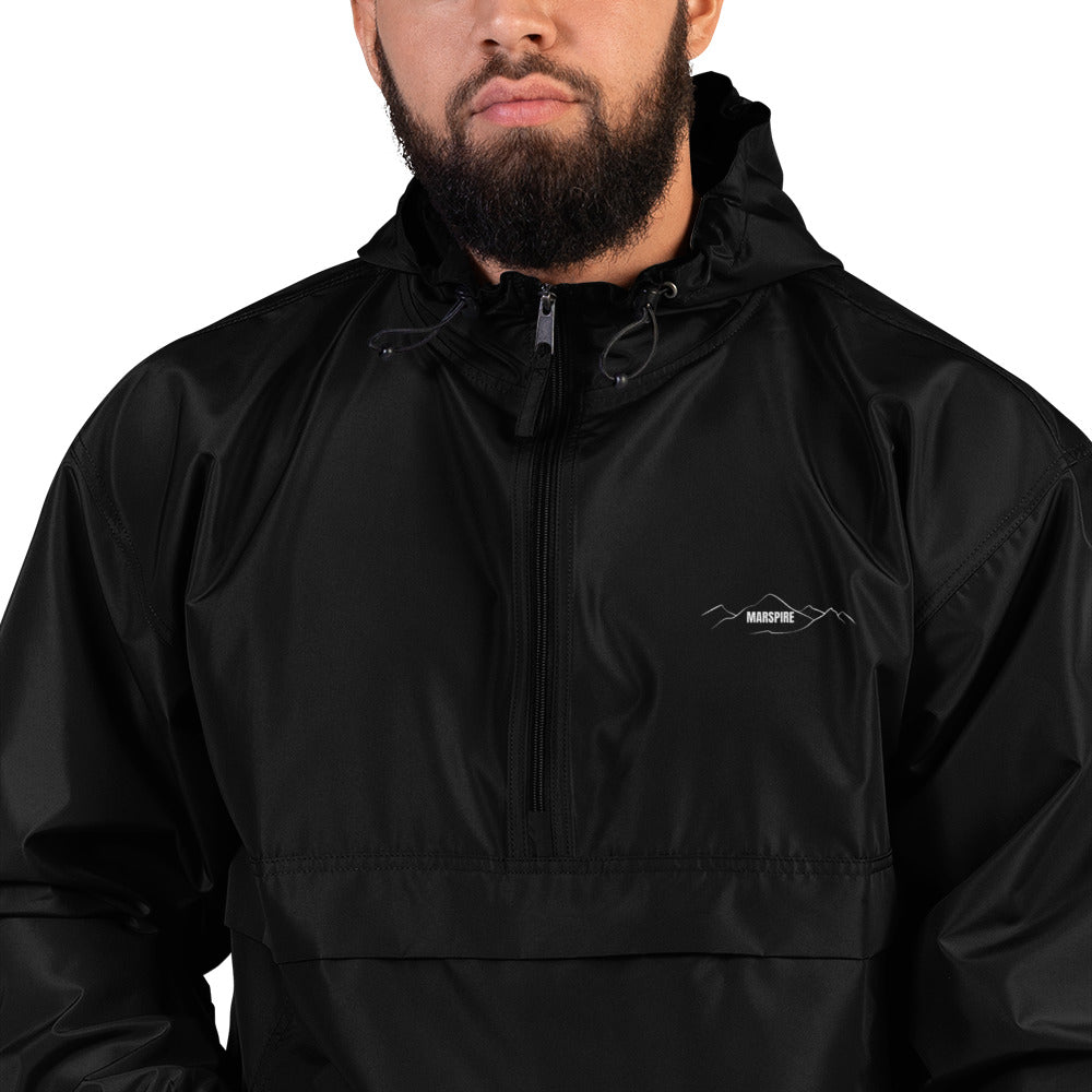 closeup of black champion packable jacket