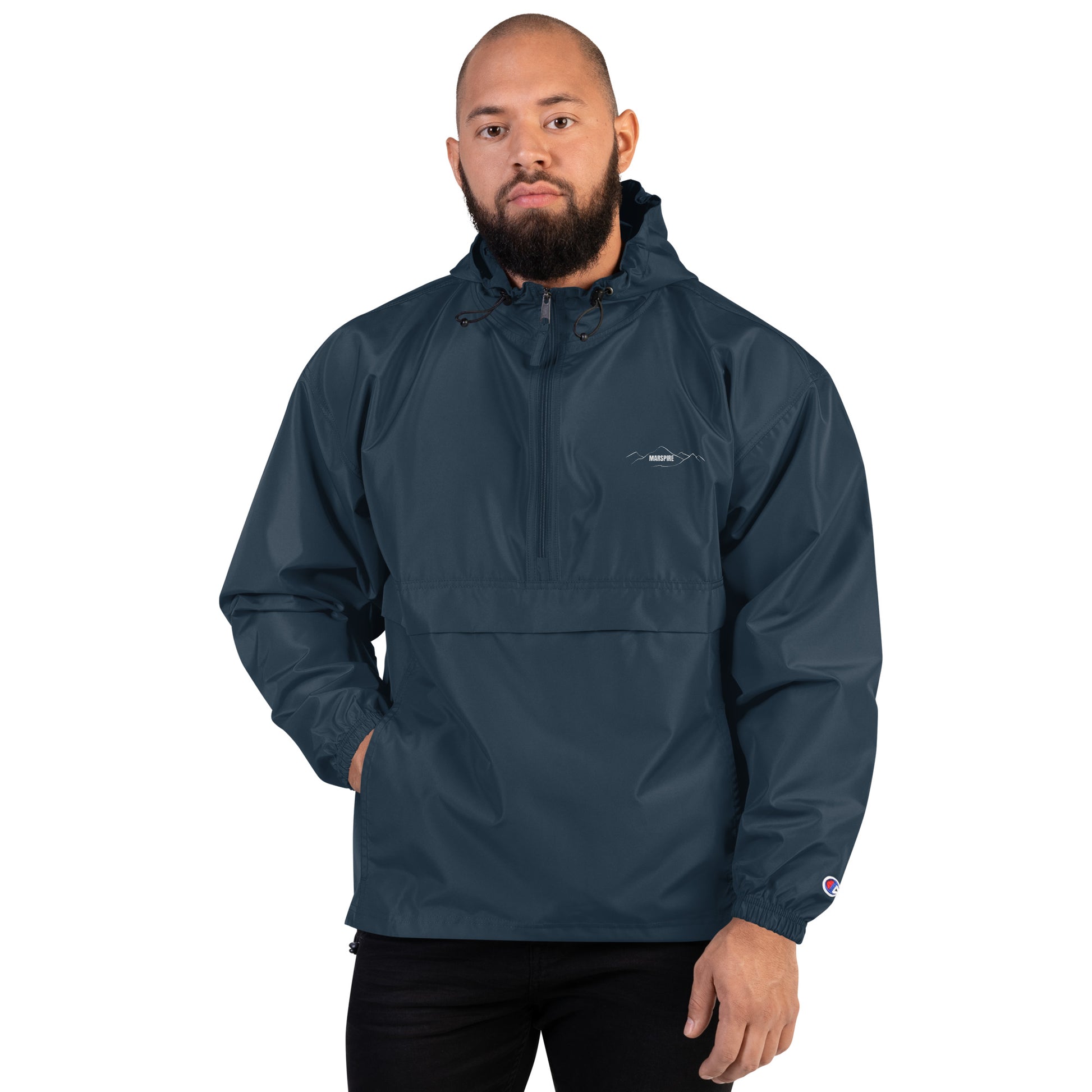 person wearing navy champion packable jacket
