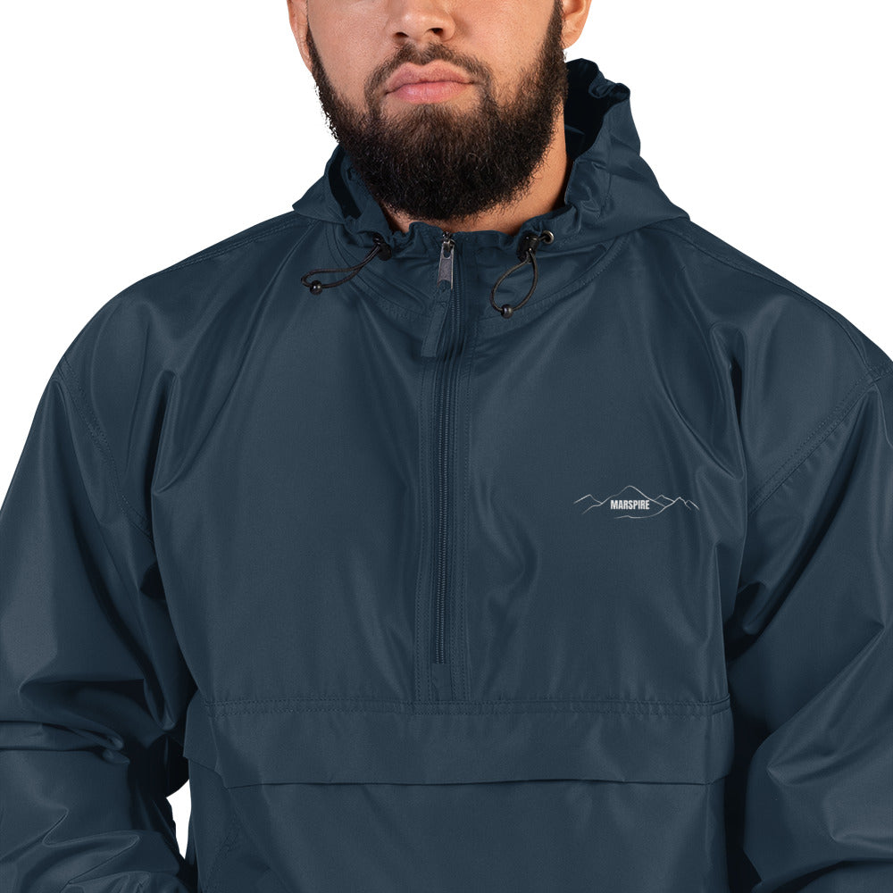closeup of navy champion packable jacket