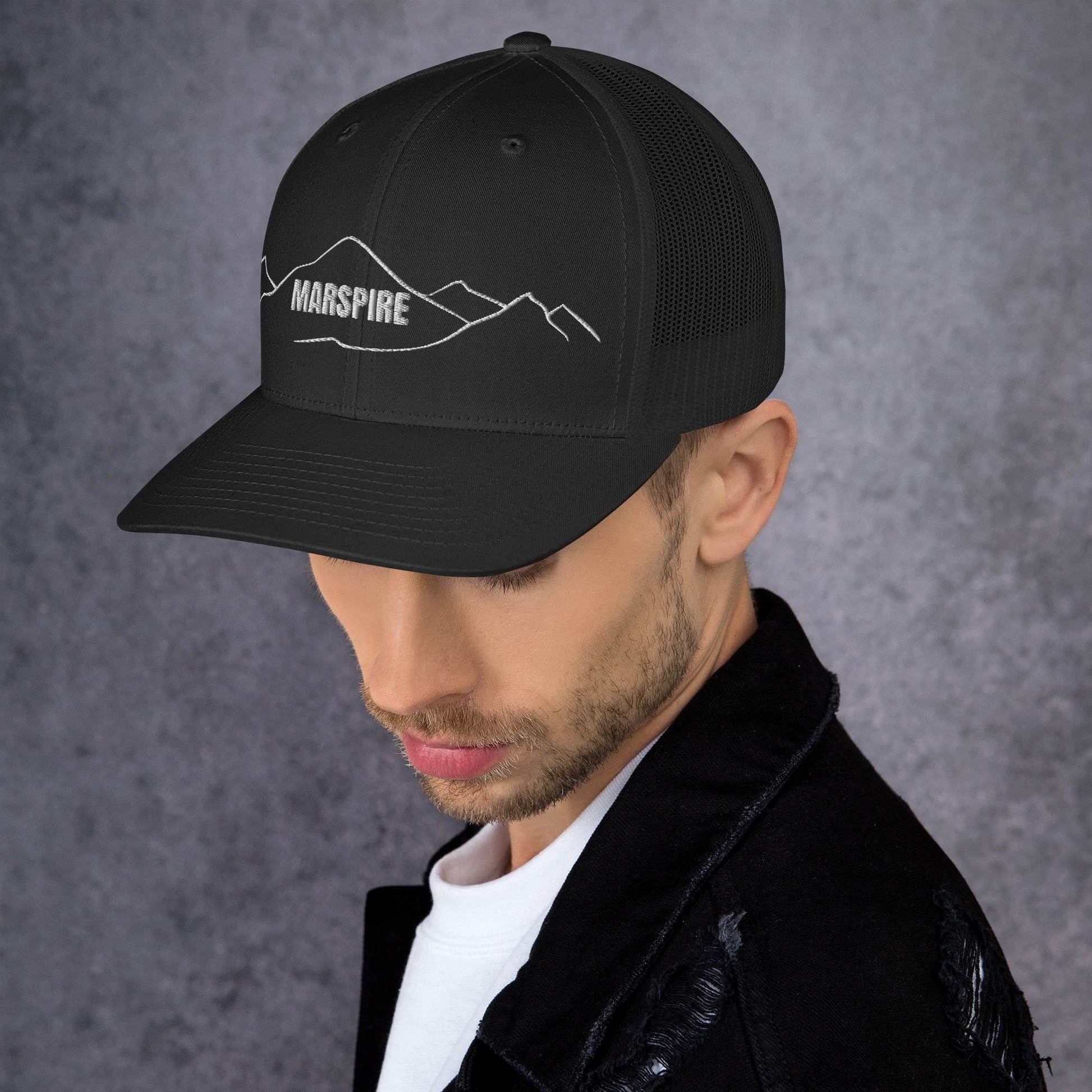 left view of black mesh trucker cap