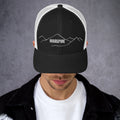 front view of black & white mesh trucker cap