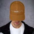 front view of caramel mesh trucker cap