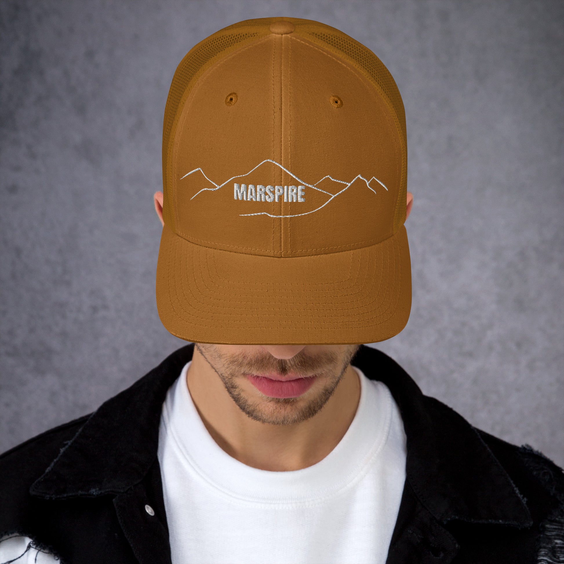 front view of caramel mesh trucker cap