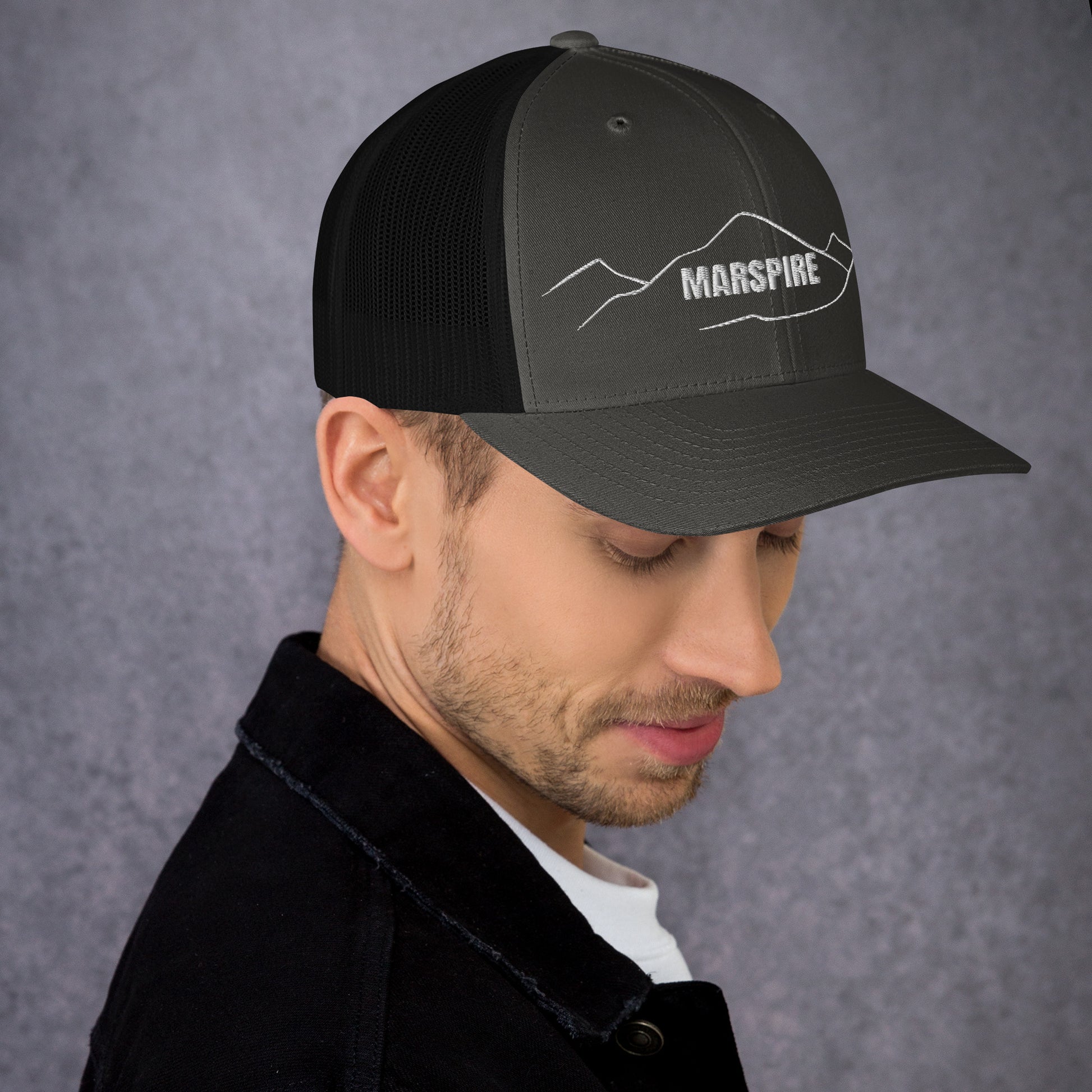 right view of charcoal mesh trucker cap