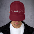 front view of cranberry mesh trucker cap