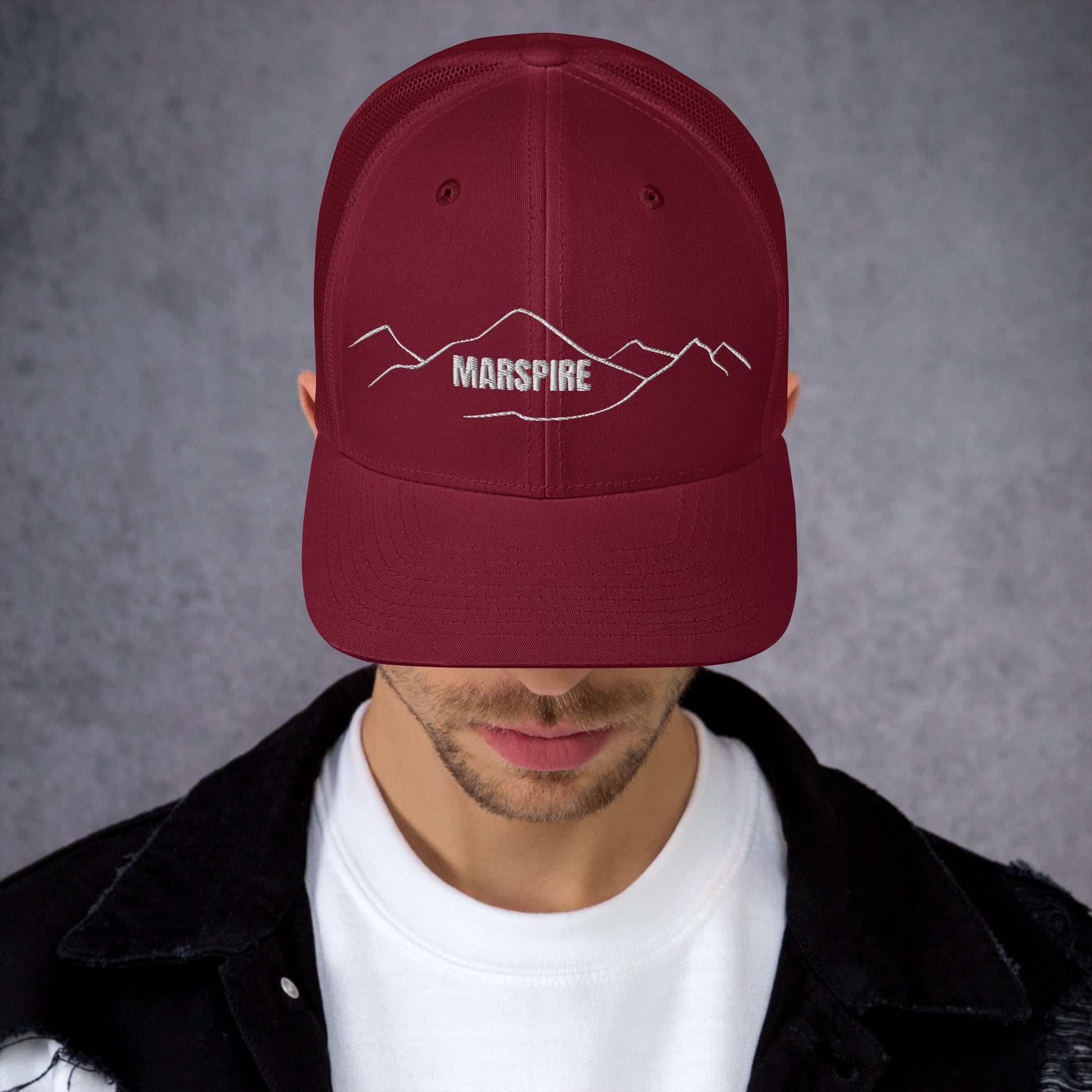 front view of cranberry mesh trucker cap