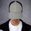front view of heather & black mesh trucker cap