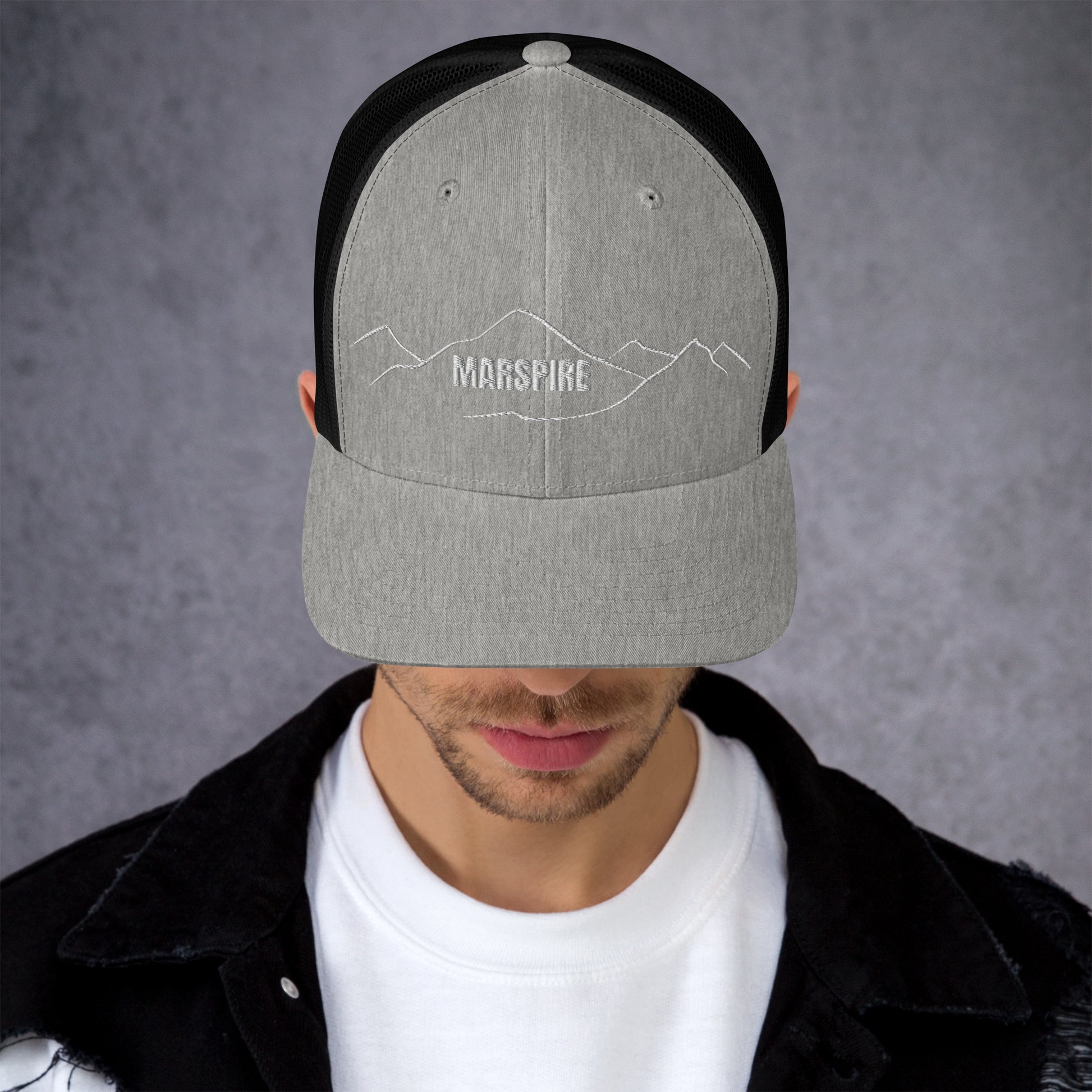 front view of heather & black mesh trucker cap