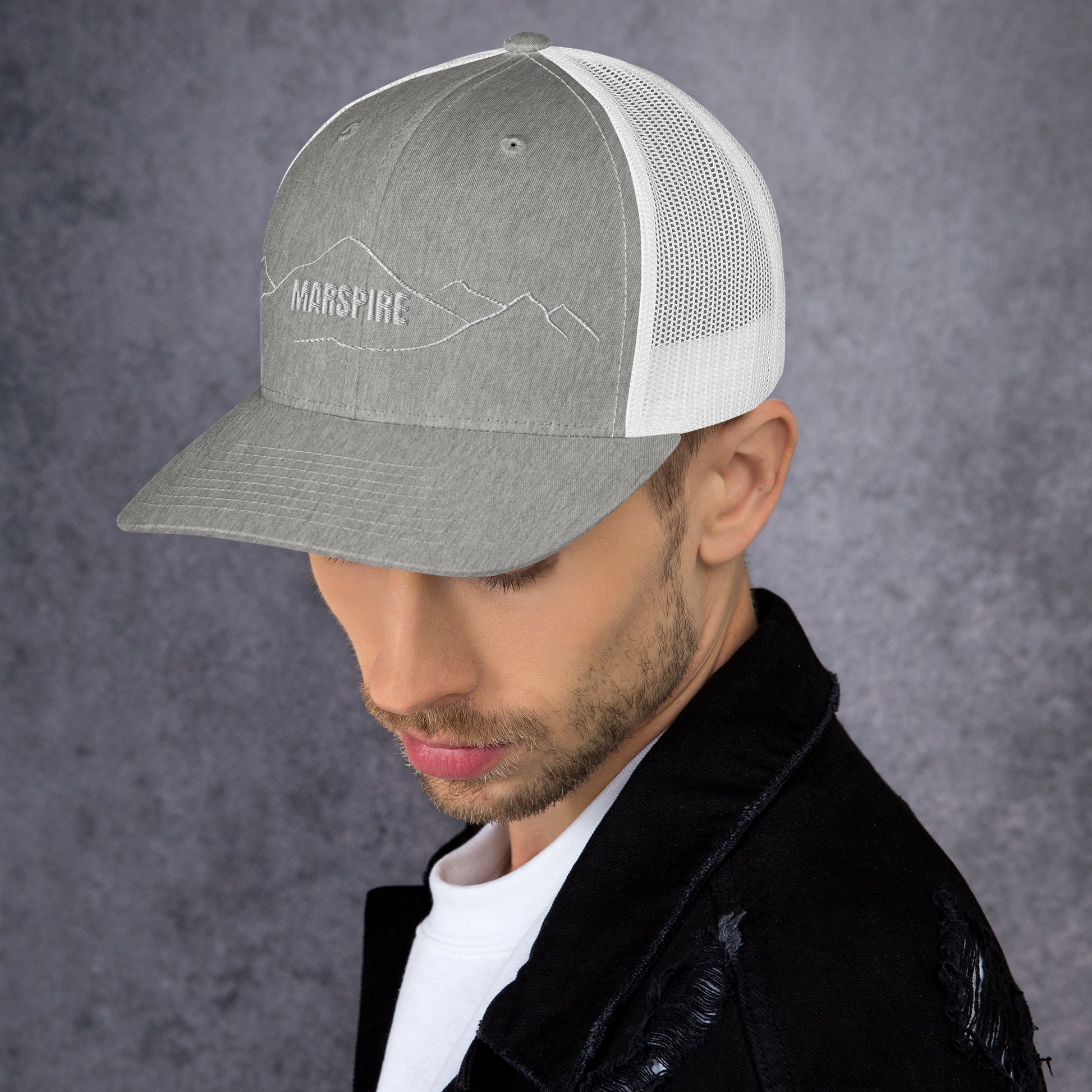 left view of heather grey & white mesh trucker cap