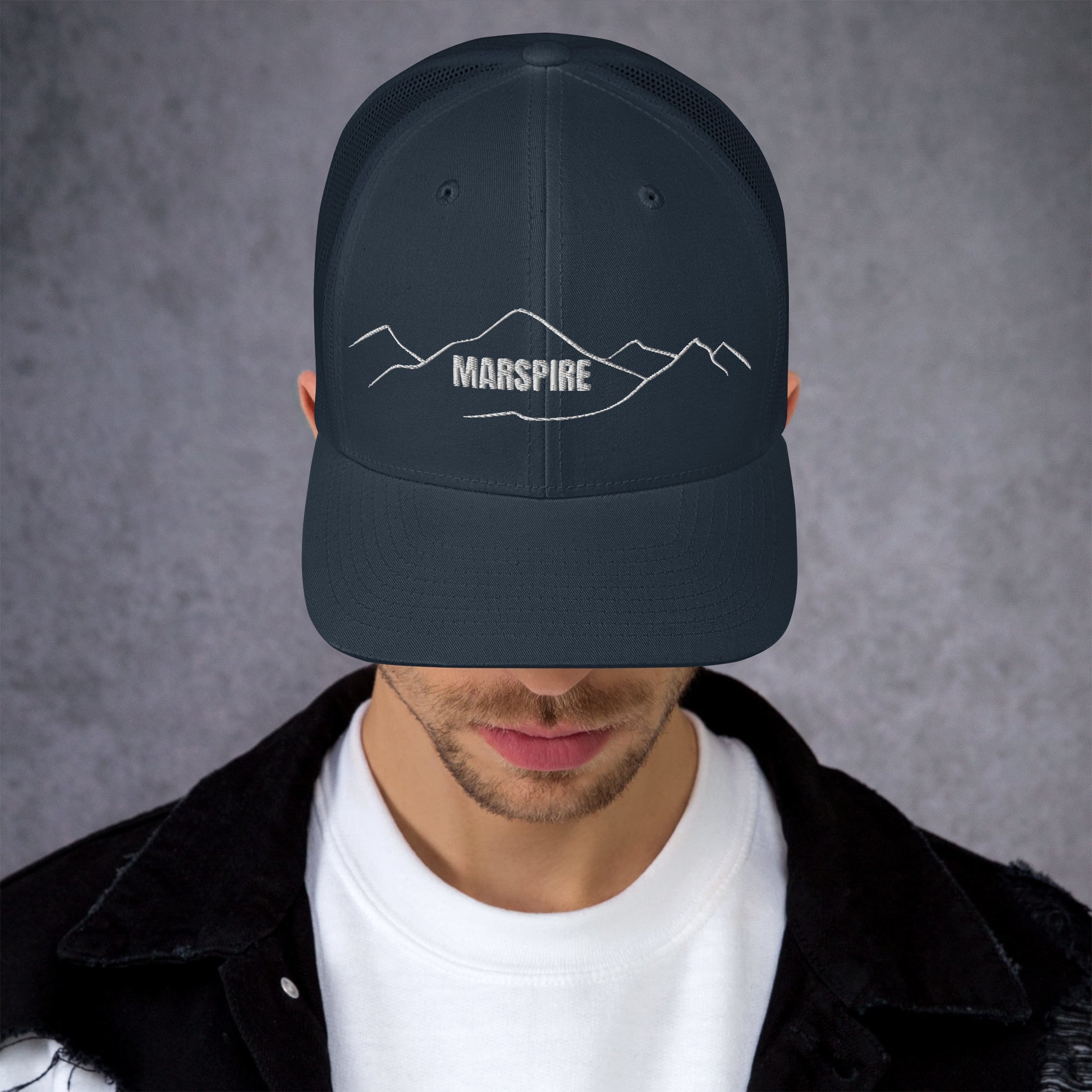 front view of navy mesh trucker cap
