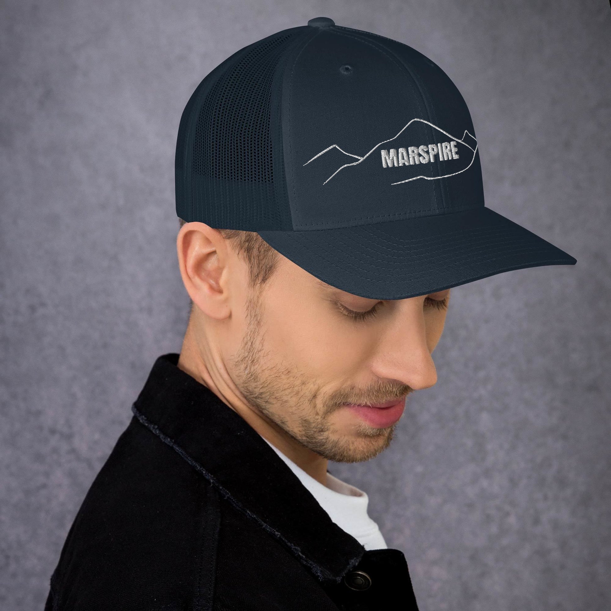 right view of navy mesh trucker cap