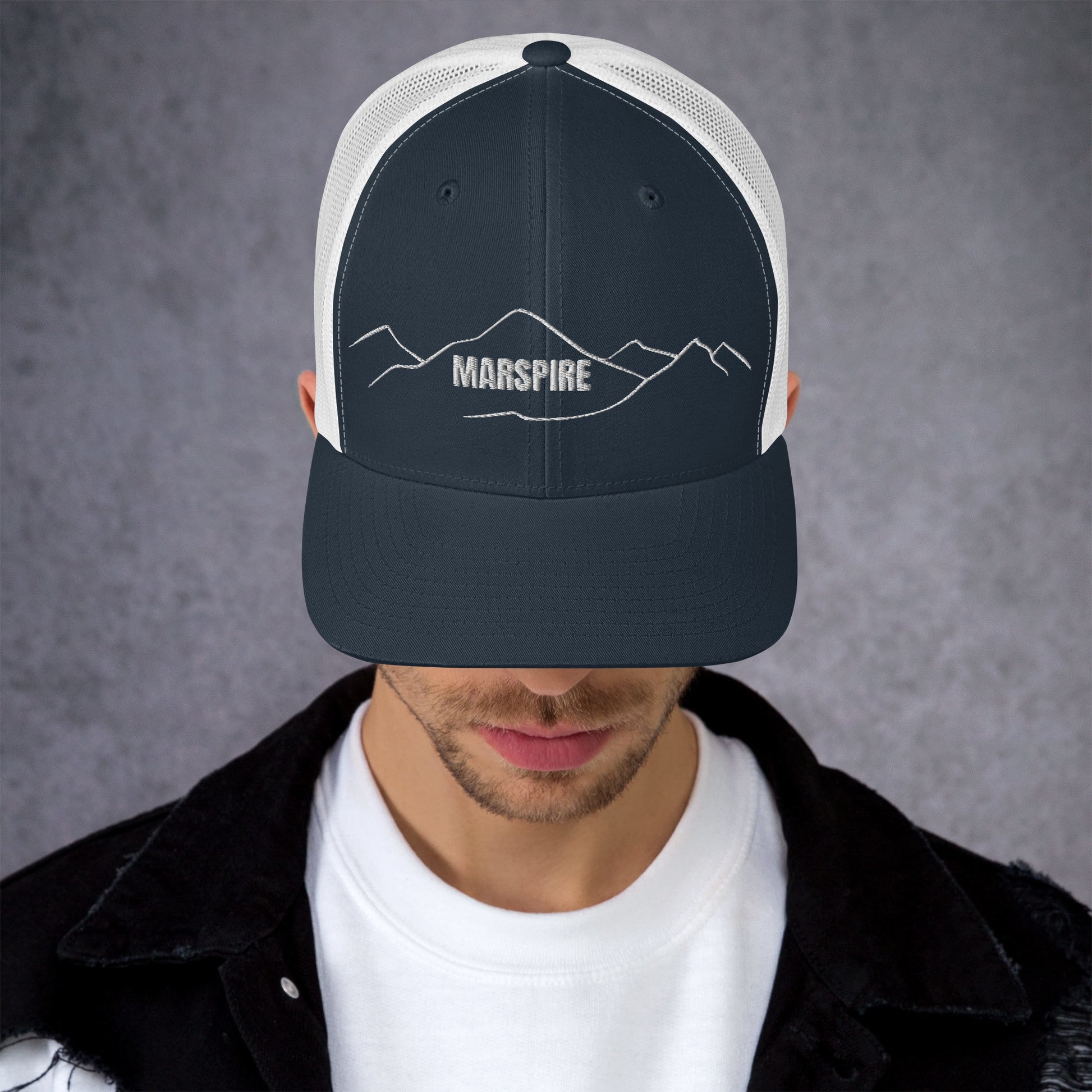 front view of navy & white mesh trucker cap
