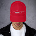 front view of red mesh trucker cap