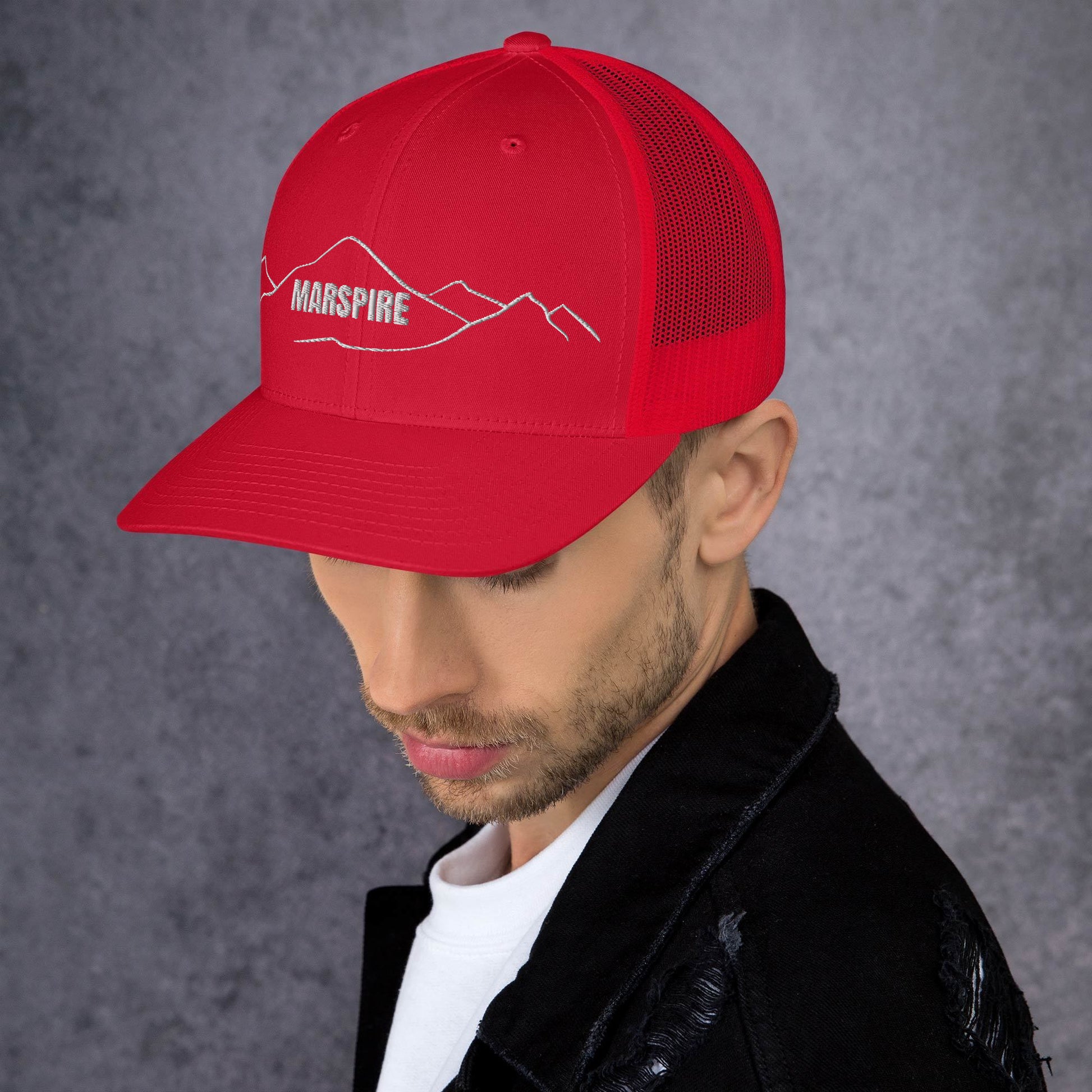 left view of red mesh trucker cap