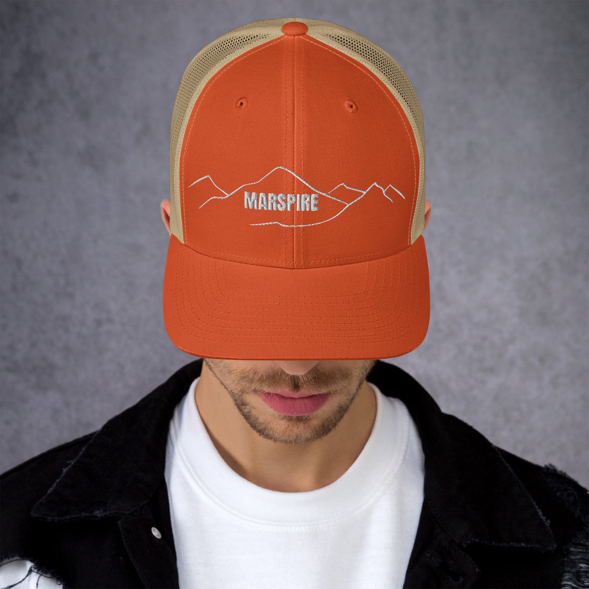 front view of rustic orange & khaki mesh trucker cap