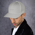 left view of silver mesh trucker cap