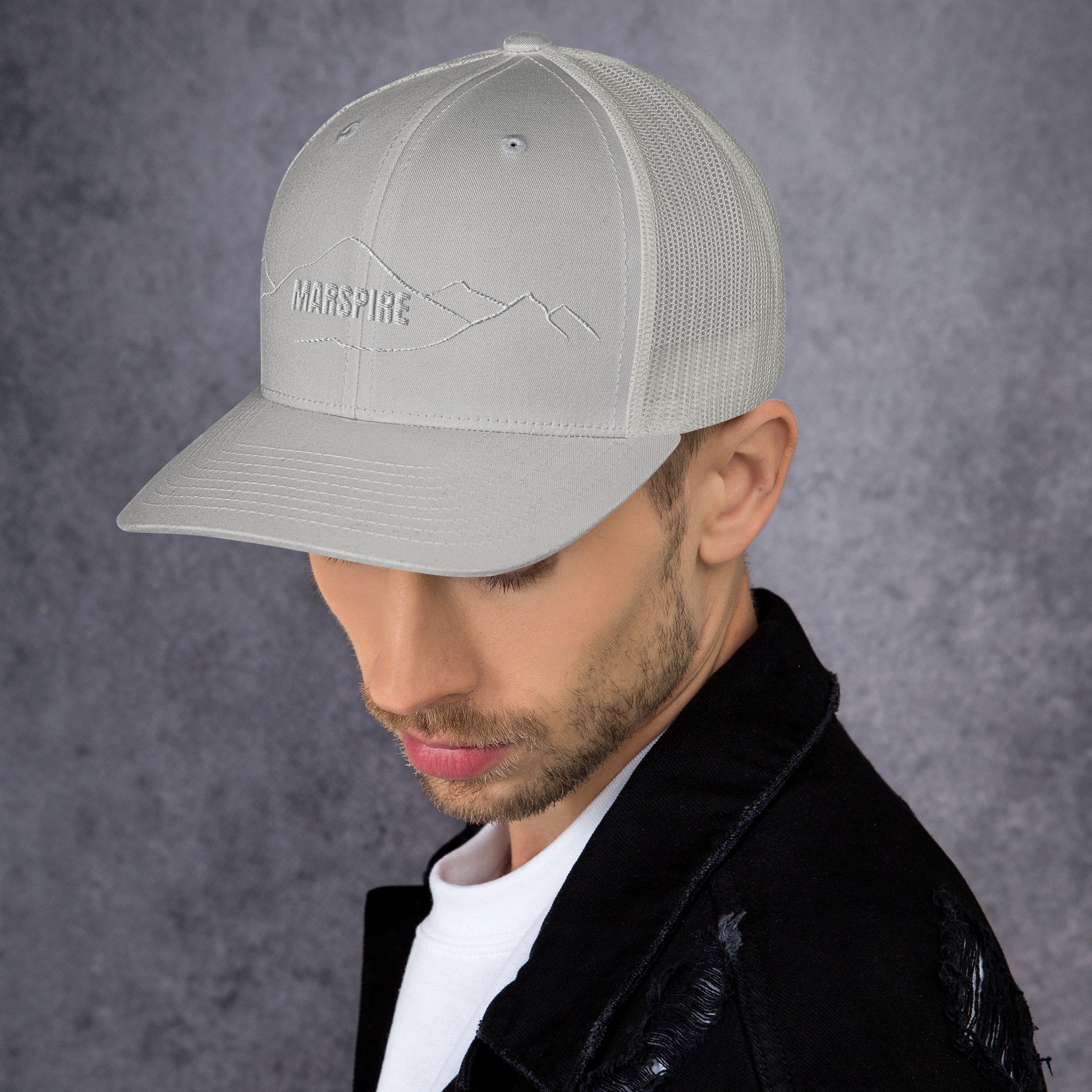 left view of silver mesh trucker cap