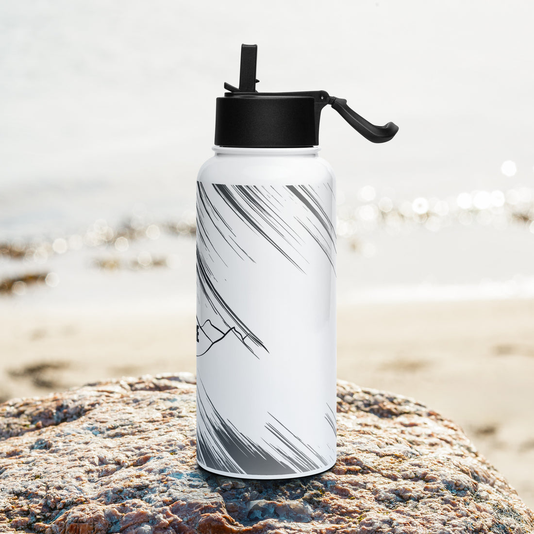 stainless steel water bottle with straw visible in right view