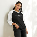 person wearing black & white raglan tee shirts