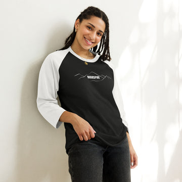 person wearing black & white raglan tee shirts