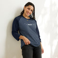 person wearing heather denim & navy raglan tee shirts