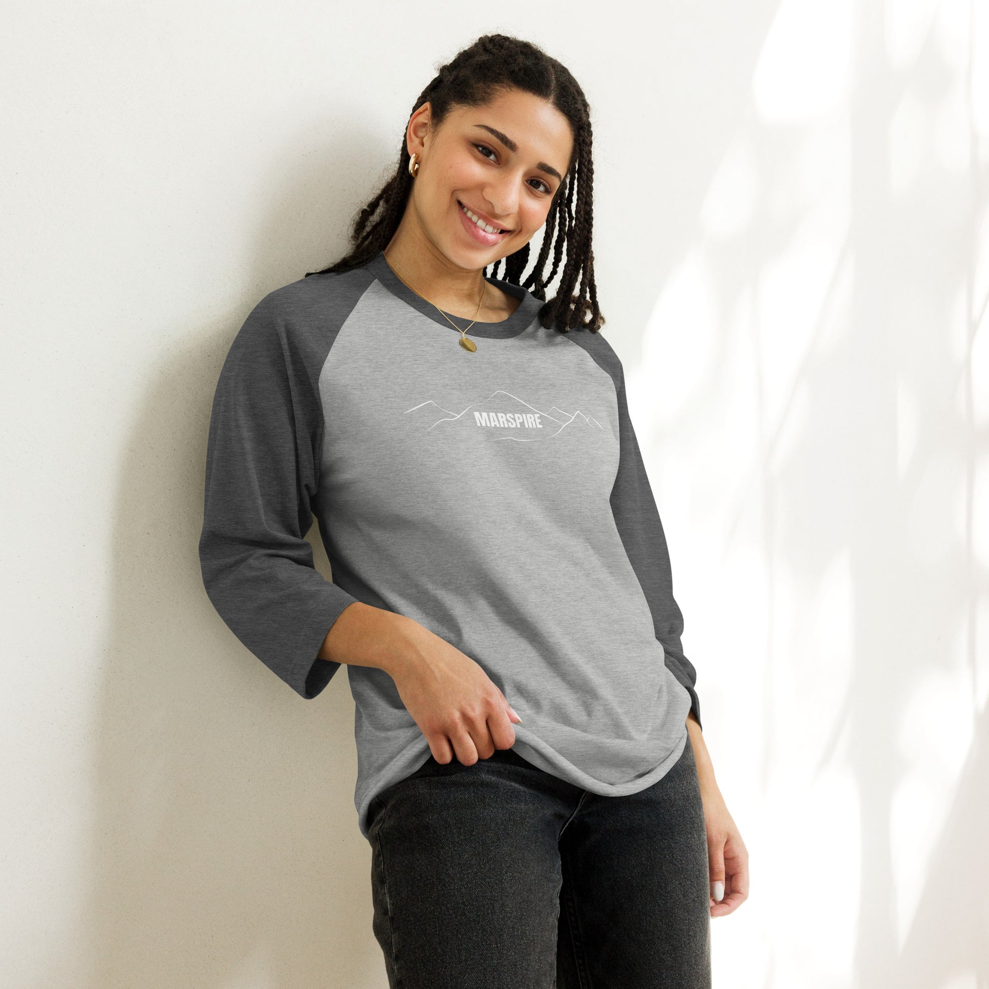 person wearing heather grey & heather charcoal raglan tee shirts