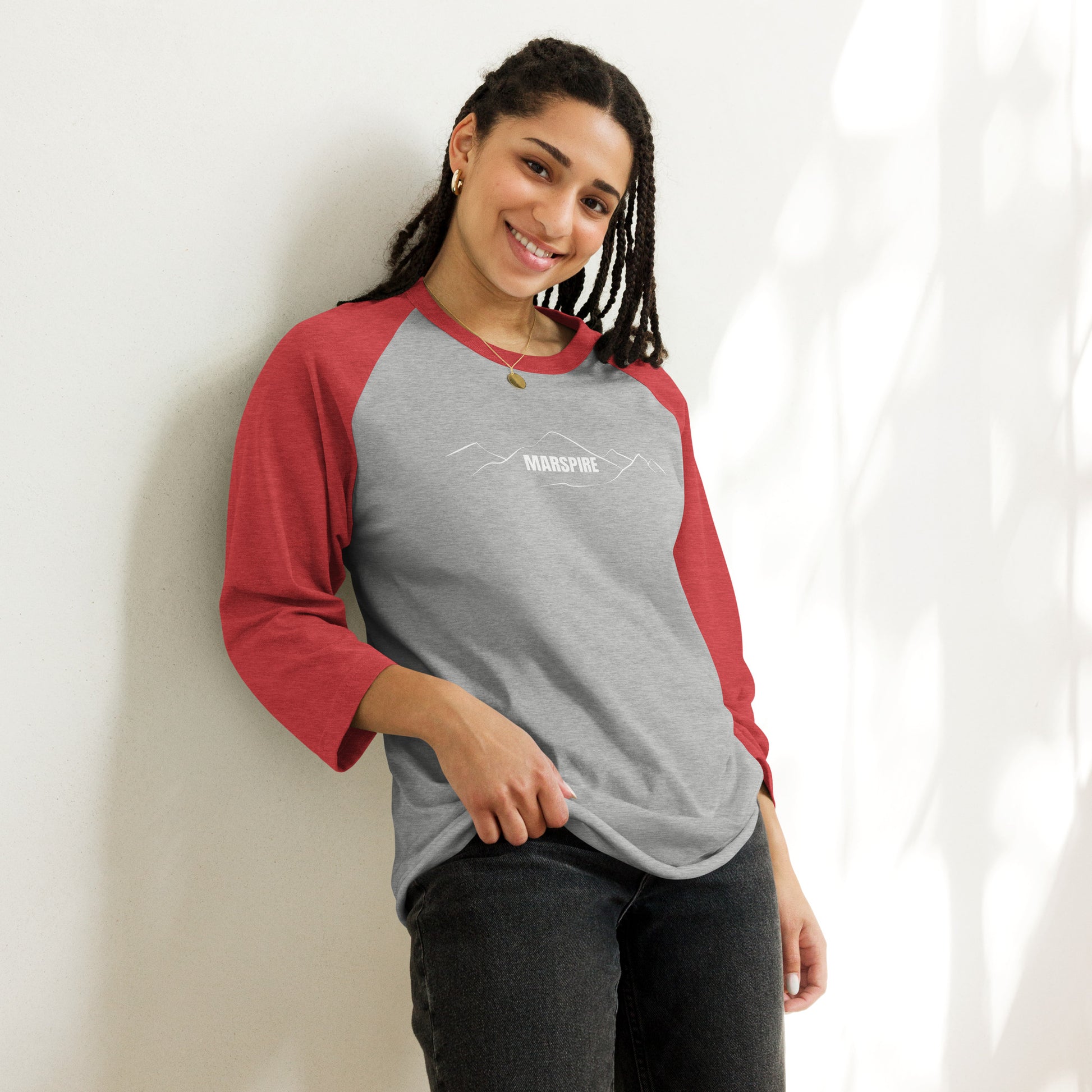 person wearing heather grey & heather red raglan tee shirts