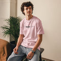 person wearing cotton pink cotton t-shirt