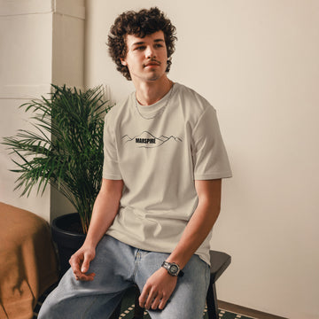 person wearing desert dust cotton t-shirt